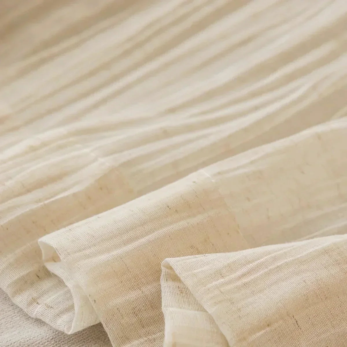 Lightweight crinkled linen gauze drapes for living room, offering semi-privacy and light-filtering.