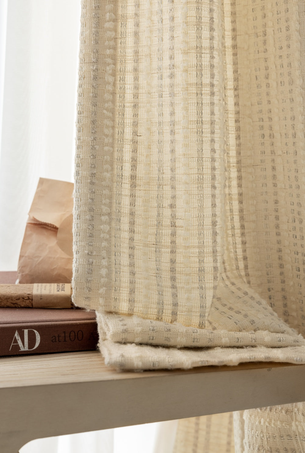 Designer white blackout curtains with subtle stripes, inspired by Agnes Martin's minimalist artistry.
