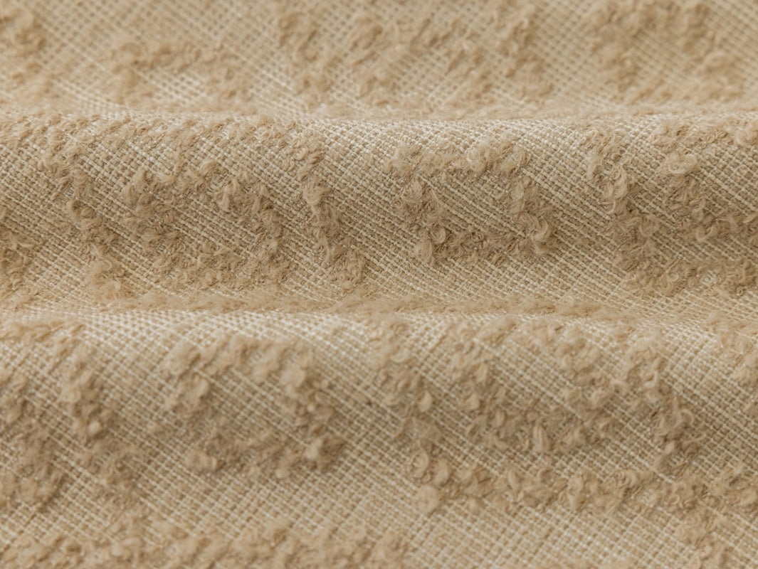 Gold curtains with textured jacquard diamond pattern inspired by Paul Cézanne.