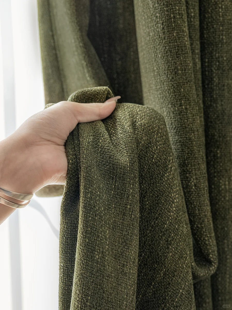 Heavyweight chenille custom curtains in green, showcasing rich texture and luxurious feel, ideal for bedroom blackout.