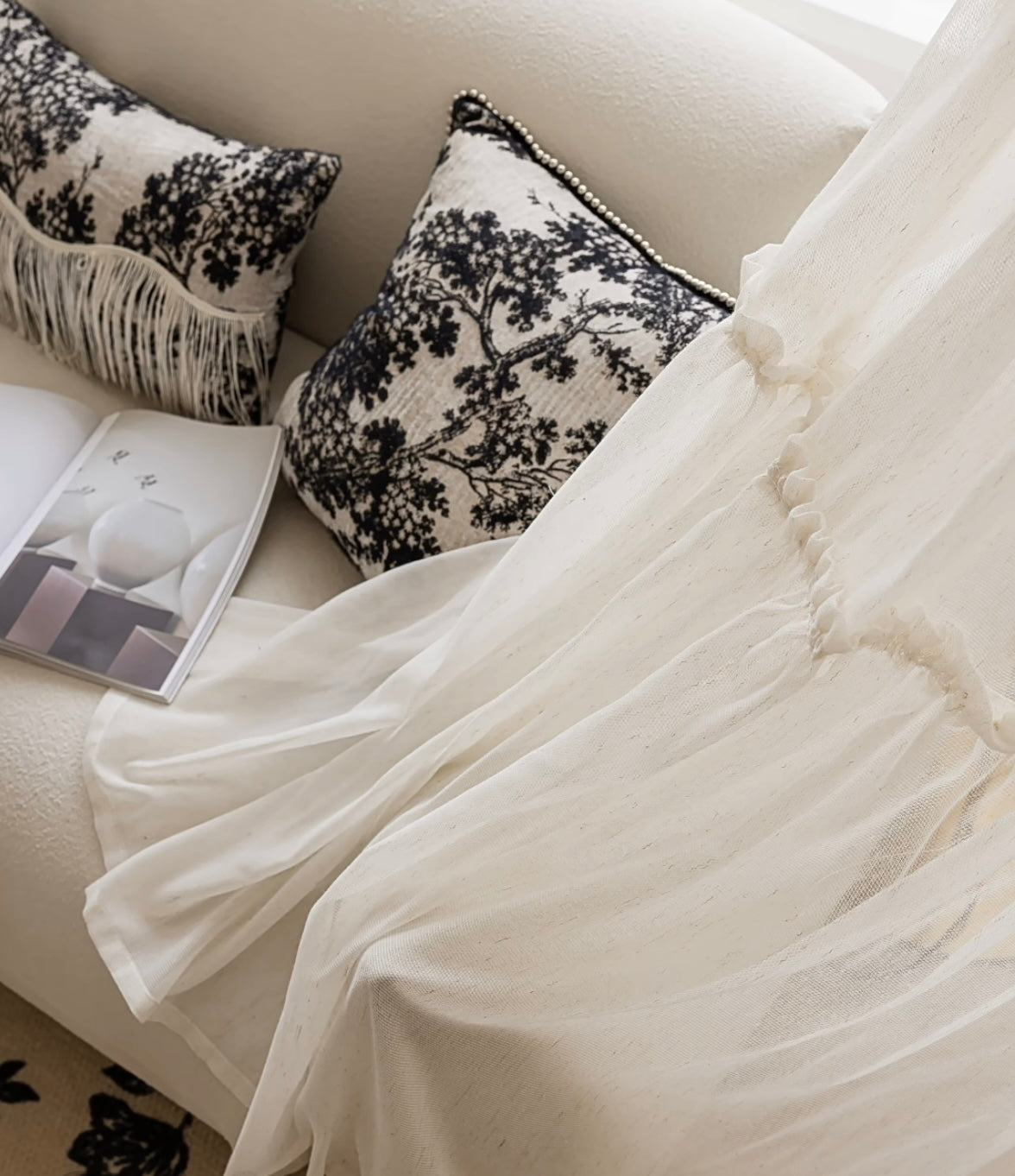 Cream sheer curtains with ruffled hem for princess room.
