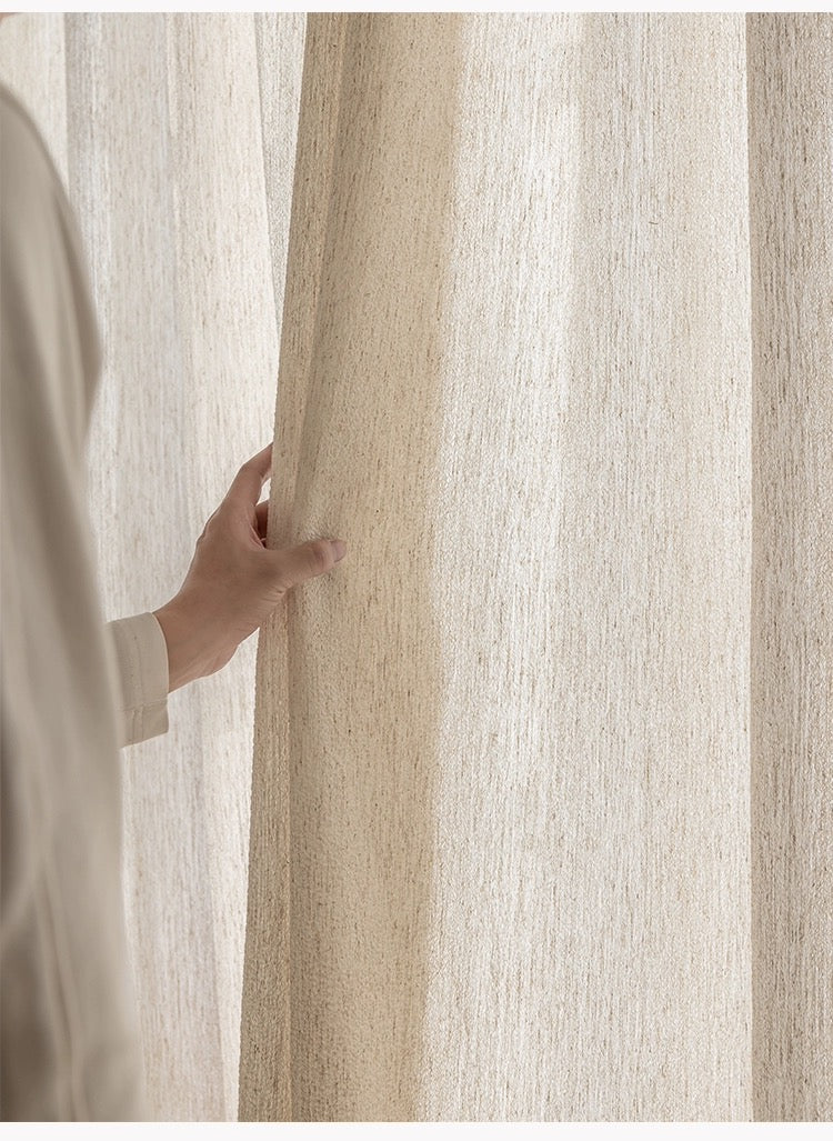 Linen-wool blend sheer curtains with textured oatmeal hue for elegant living room decor.