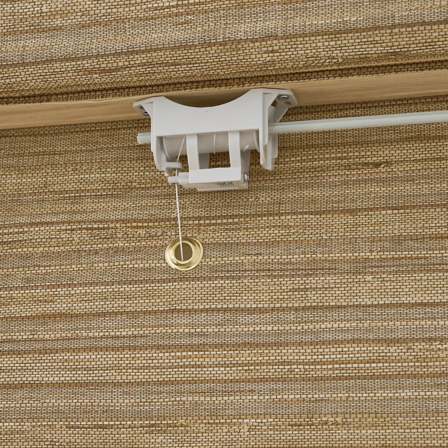 Natural hemp outdoor bamboo shades in beige brown, showcasing handwoven texture and Roman shade design.