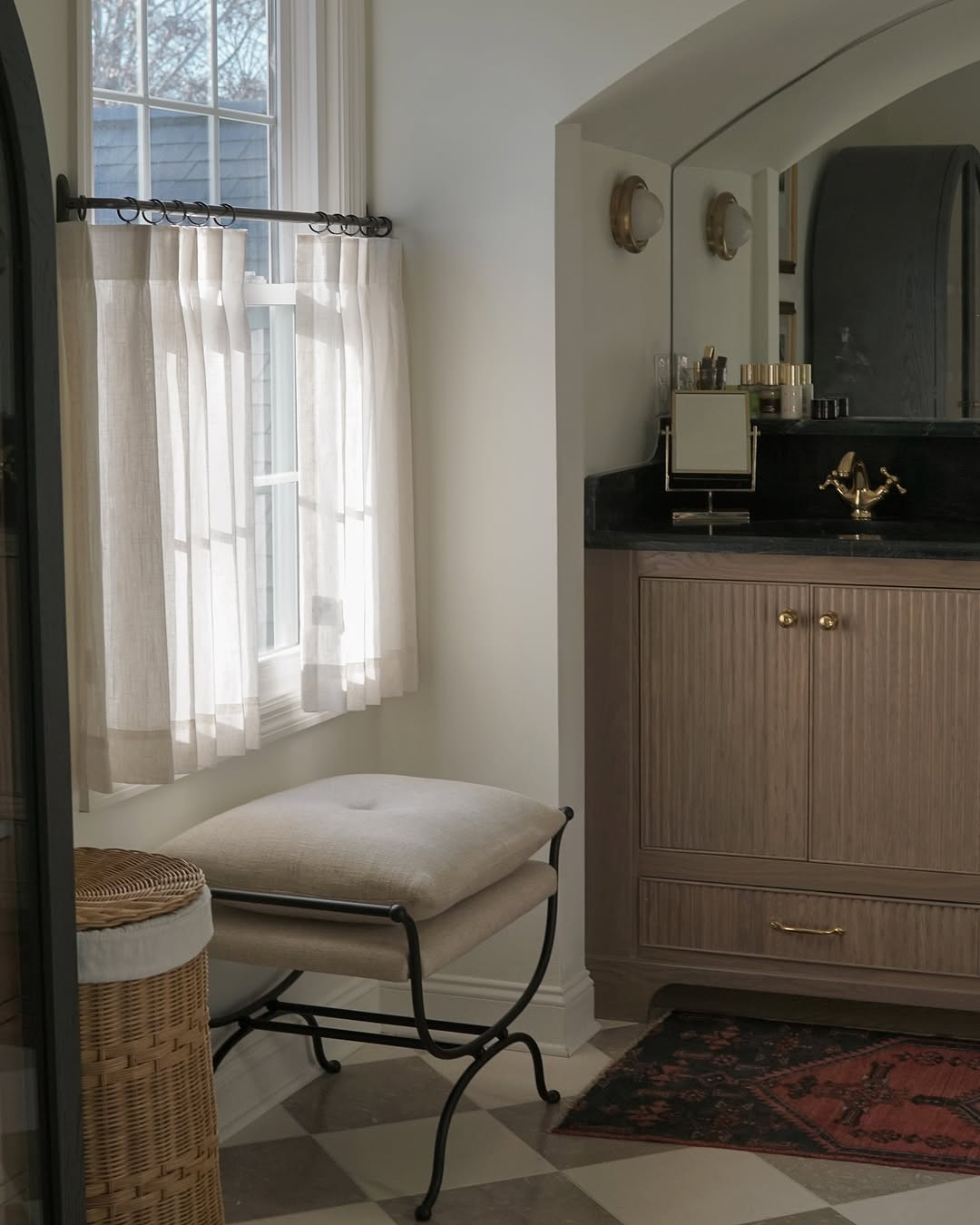 Custom Cafe Curtains in light, semi-sheer fabric filtering sunlight in a cozy, elegant kitchen setting.