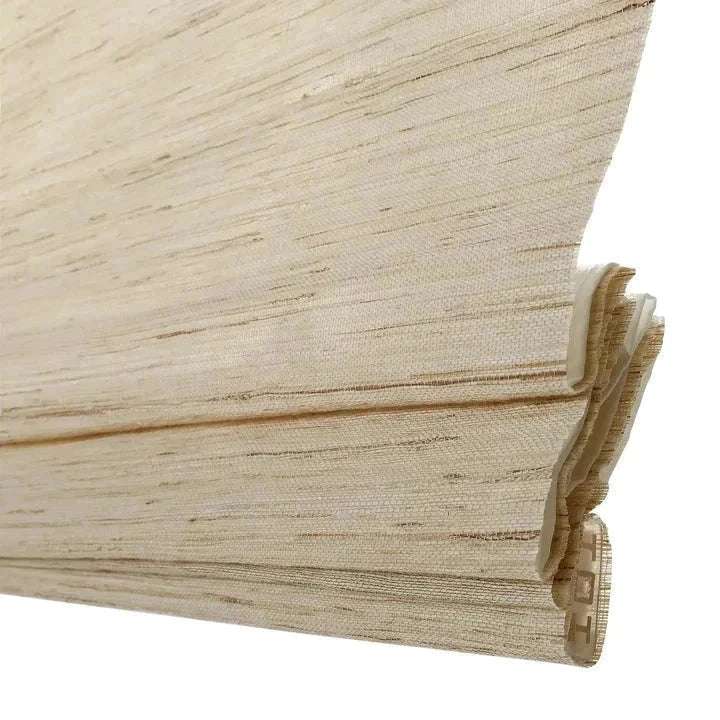Natural custom bamboo shades in cashew, mildew-resistant woven blinds, soft beige tone.