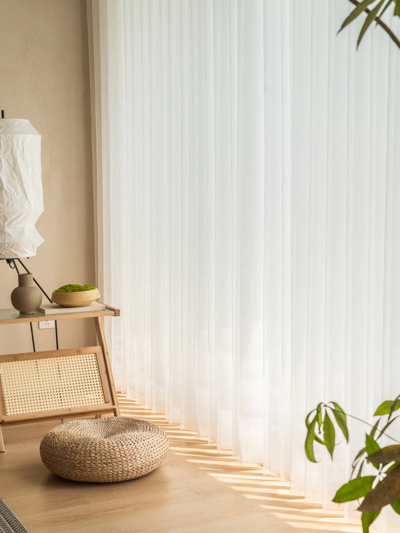 Premium sheer curtain panels diffusing light in a sunlit room.
