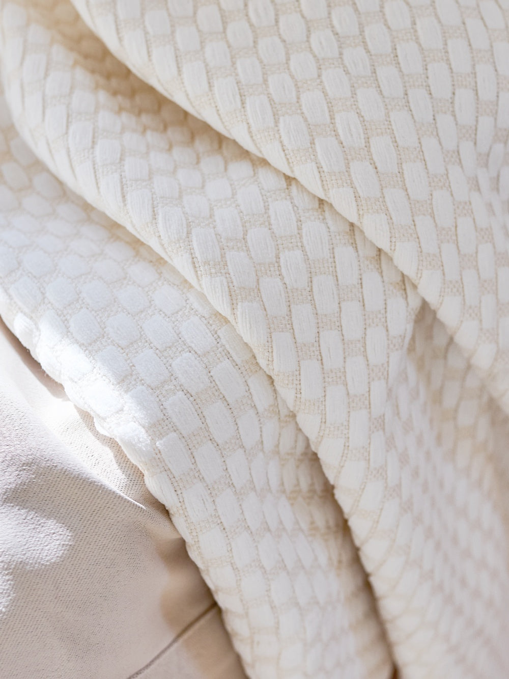 Elegant pearl-inspired thermal curtains for noise cancelling and heat blocking.