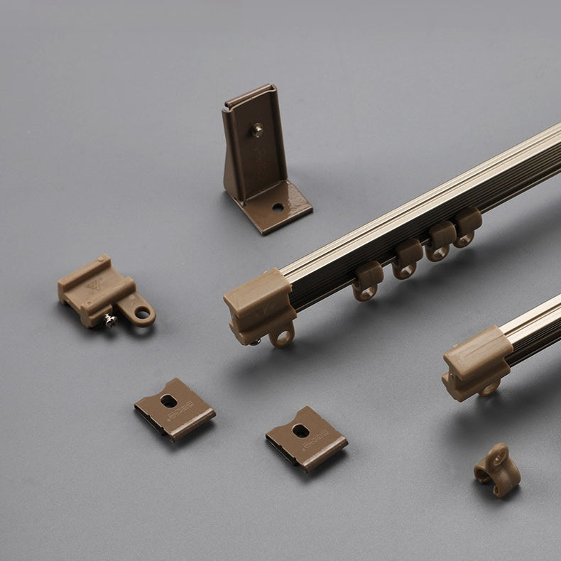 Ultra-thin curved curtain rail for bay windows with brown components.