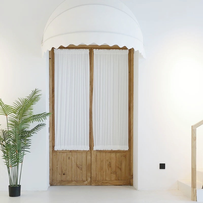 Custom rod pocket French door curtains in a cozy interior setting.