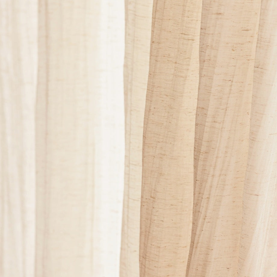 Lightweight crinkled linen gauze drapes for living room, offering semi-privacy and light-filtering.