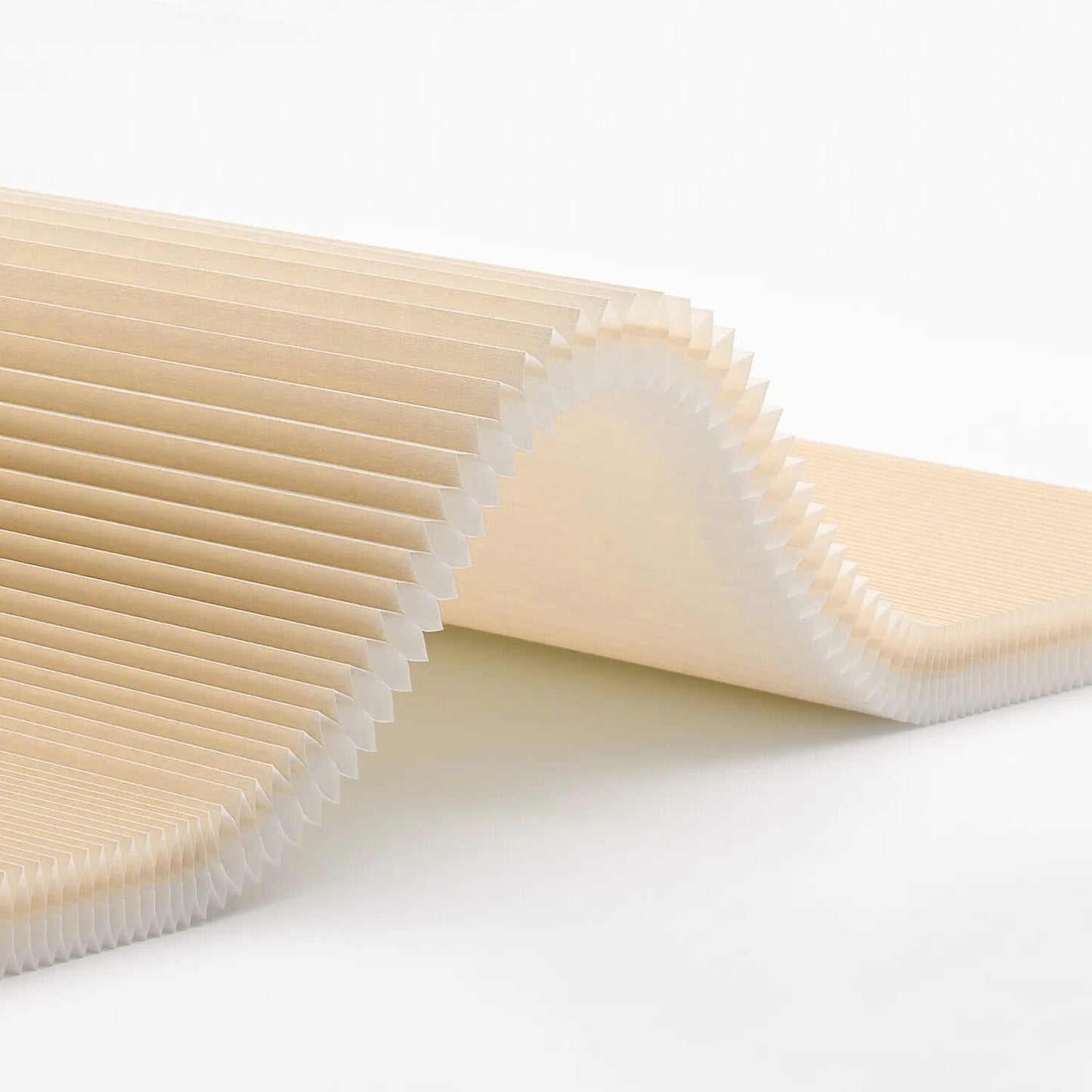 Beige no-drill honeycomb shades fabric close-up with pleated 26mm cell design