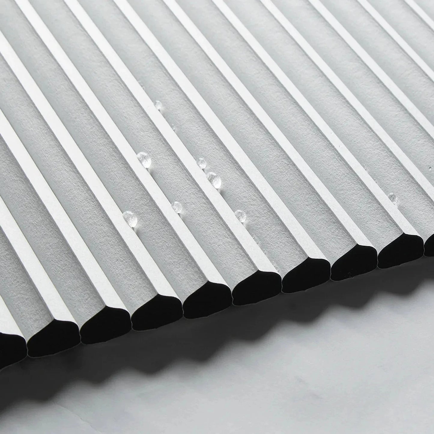 Affordable waterproof bathroom blinds with cordless honeycomb shades in five colors.