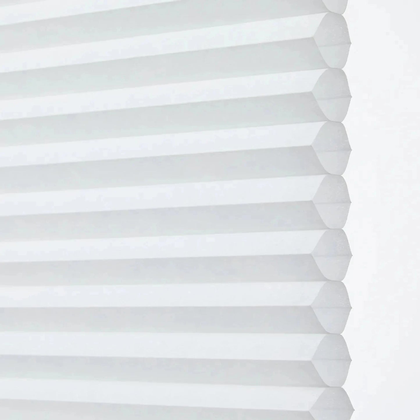 Cordless honeycomb waterproof bathroom blinds in white.