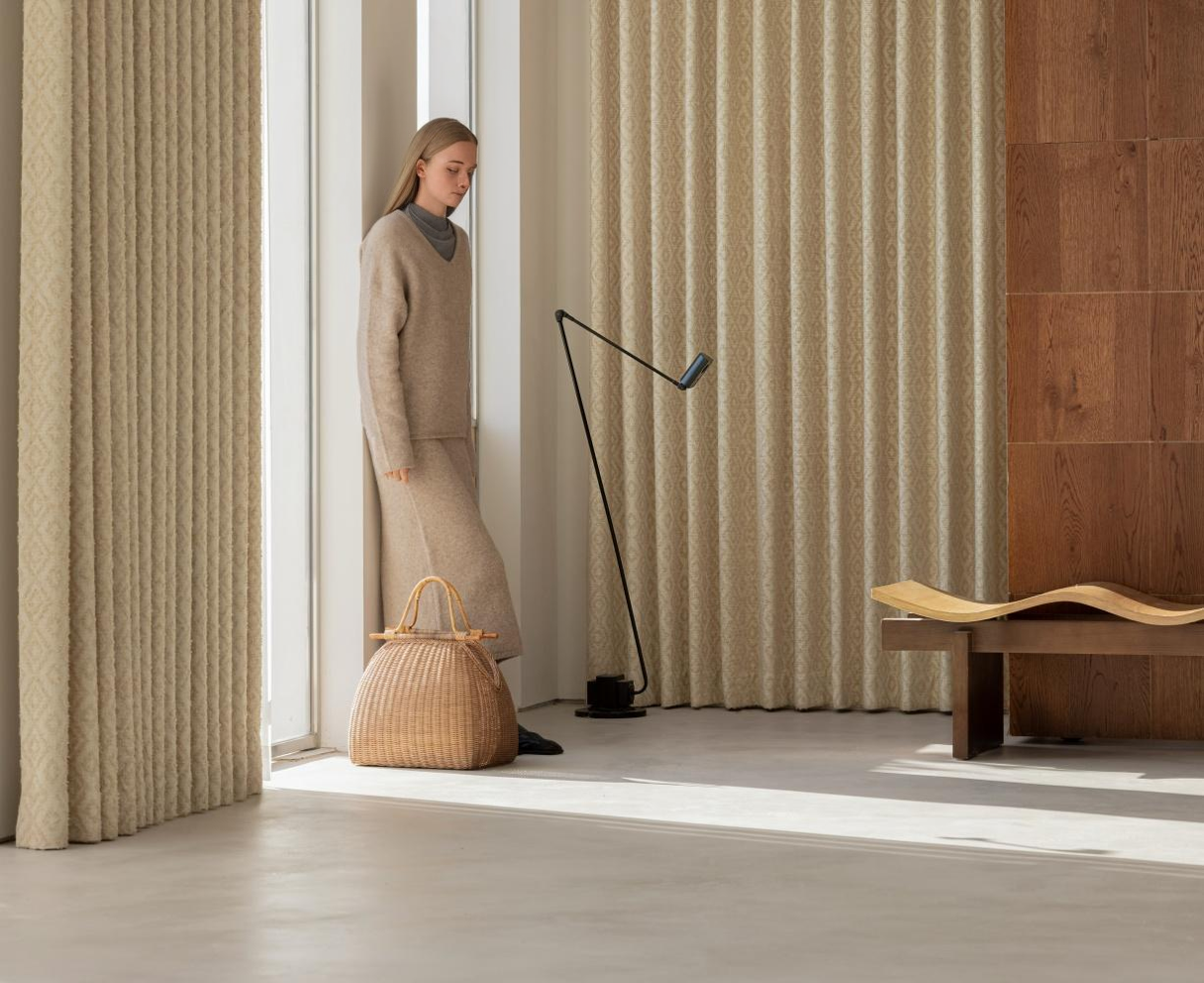 Gold curtains with diamond patterns, inspired by Paul Cézanne, enhancing a modern living space with elegance.