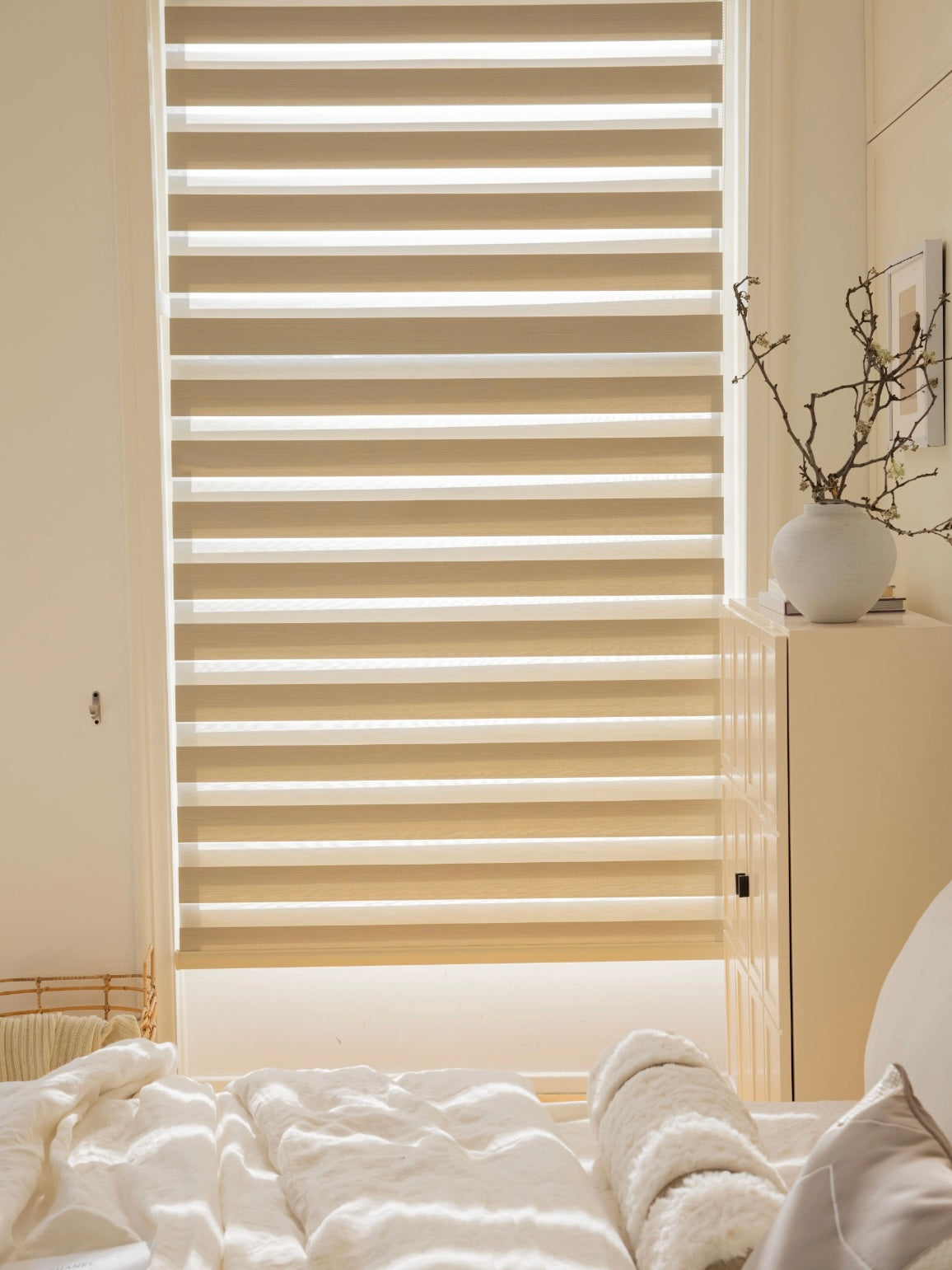 Waterproof zebra shades installed on a bathroom window, moisture-resistant dual-layer fabric