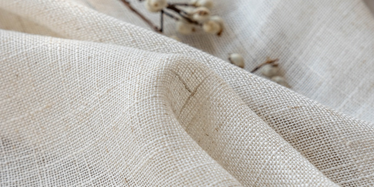 Elegant linen curtains in neutral shades enhancing home interior with warmth and privacy