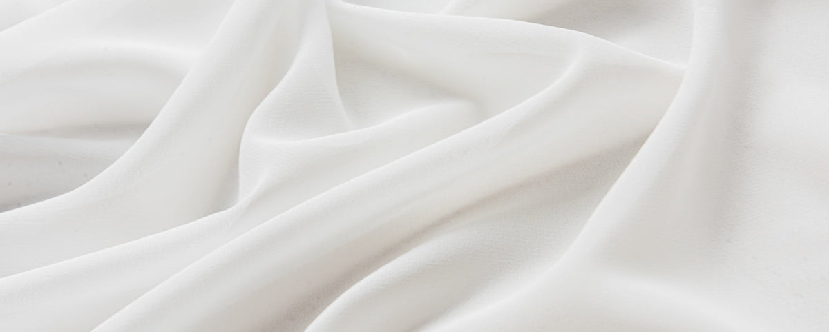 Sheer Curtains in soft white, lightweight translucent fabric with a smooth, gently draped texture and airy finish