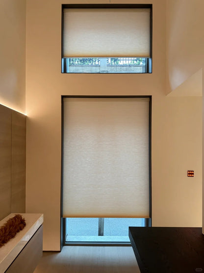 38mm large cell double-cell honeycomb shades in beige, with a very textured and high-quality feel.