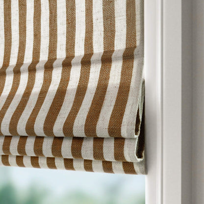 Close-up of classic striped roman shades in brown and white with a cordless lift system on a window frame