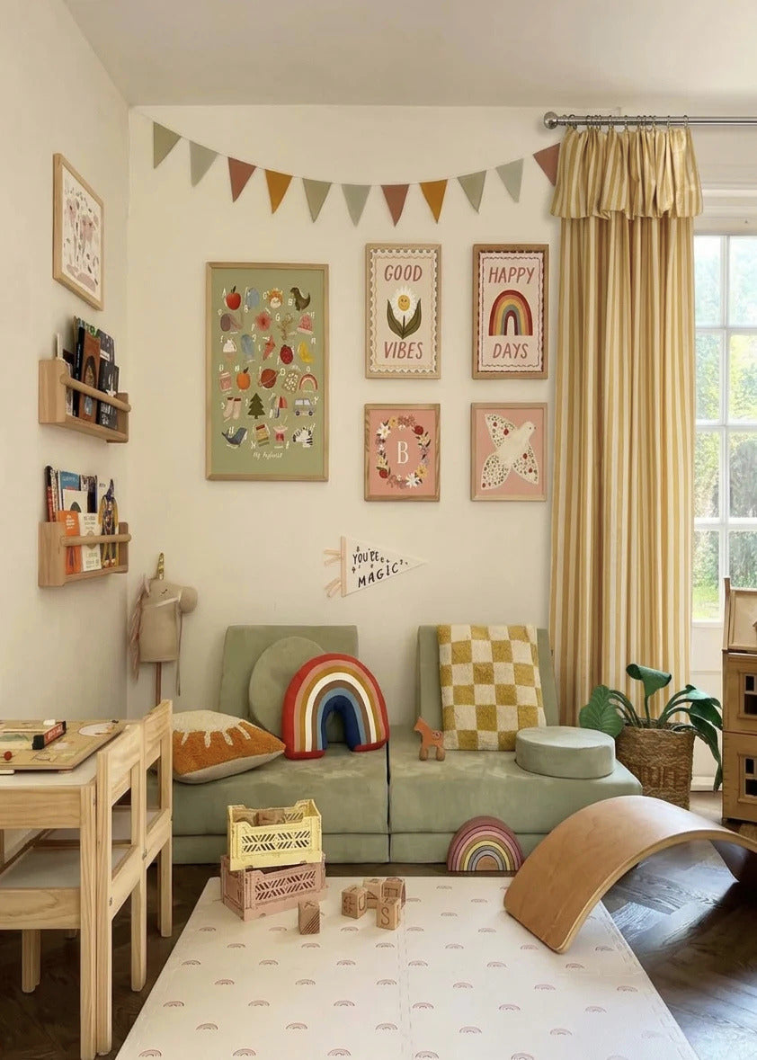 Soft yellow striped linen playroom curtains hanging in a bright kids room