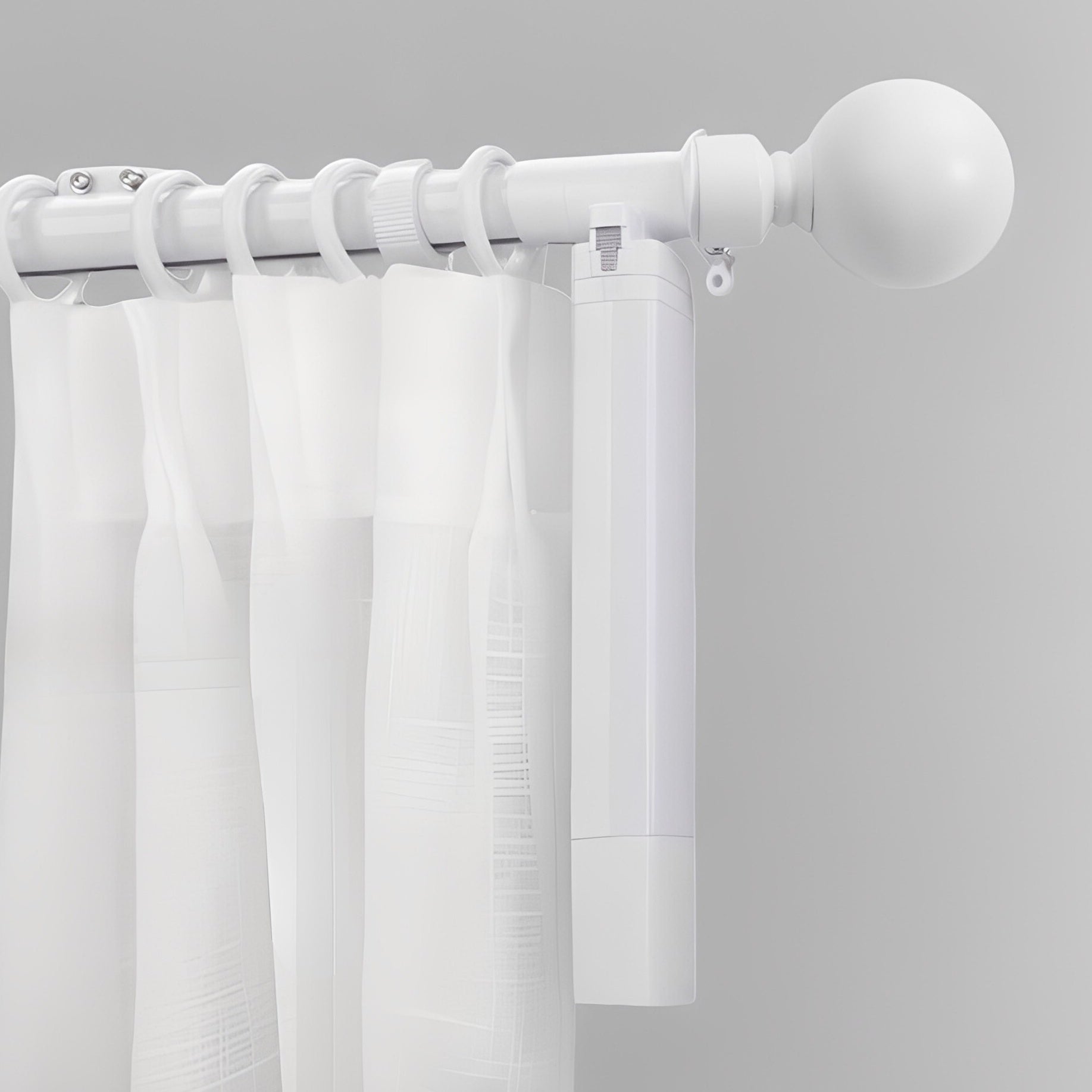 white electric curtain rod with smart motor and modern white curtains on gray wall