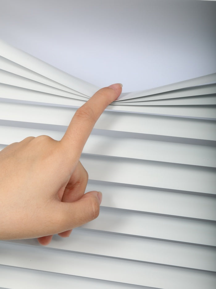 Finger adjusting durable cordless vinyl blinds with aluminum slats, ideal for mini windows.