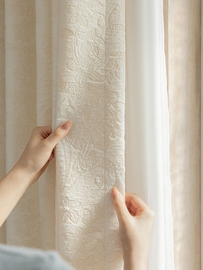 French embossed white blackout curtains with elegant pattern.