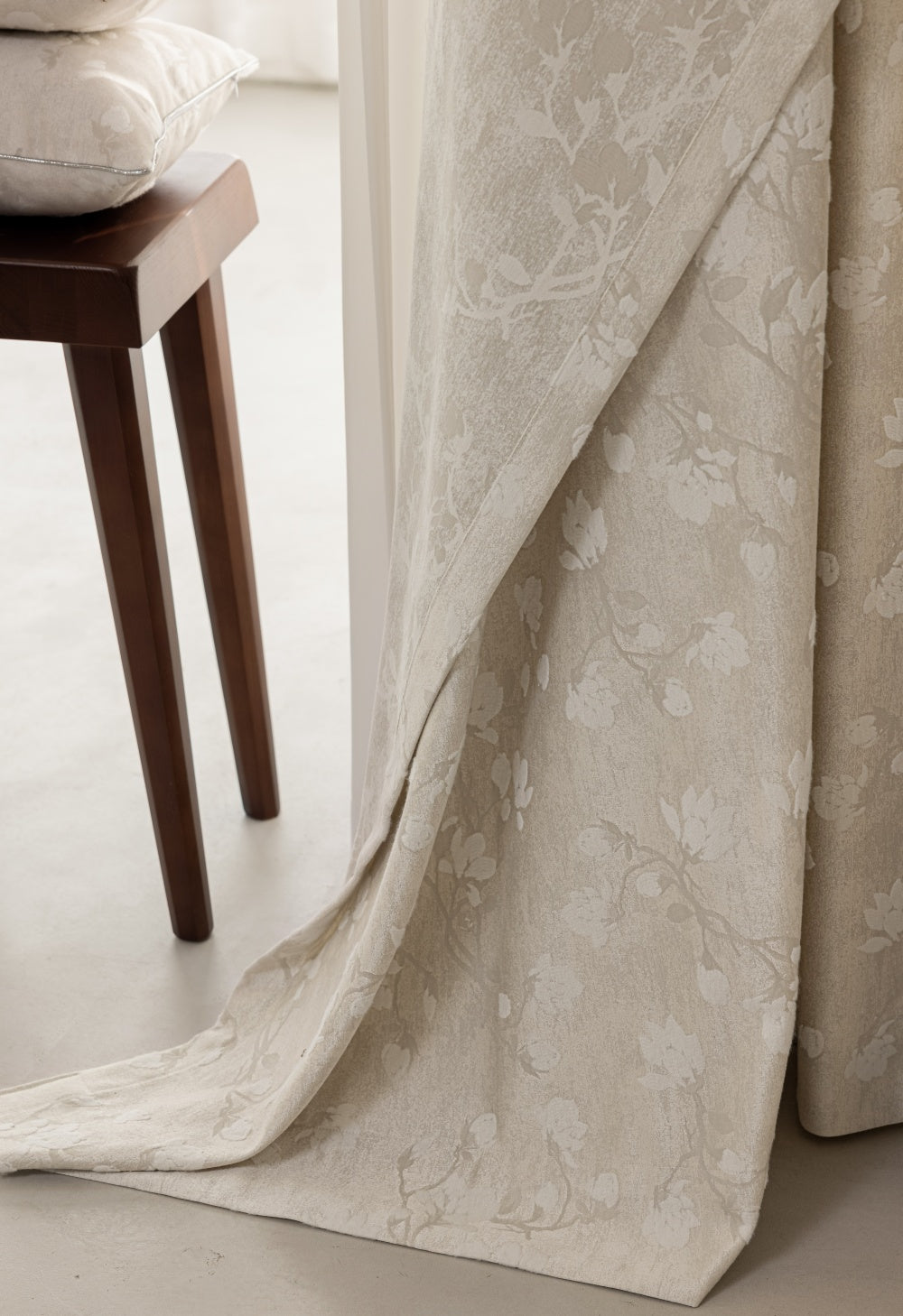 Luxury magnolia embroidery pattern curtains in neutral tones, showcasing elegant floral design.