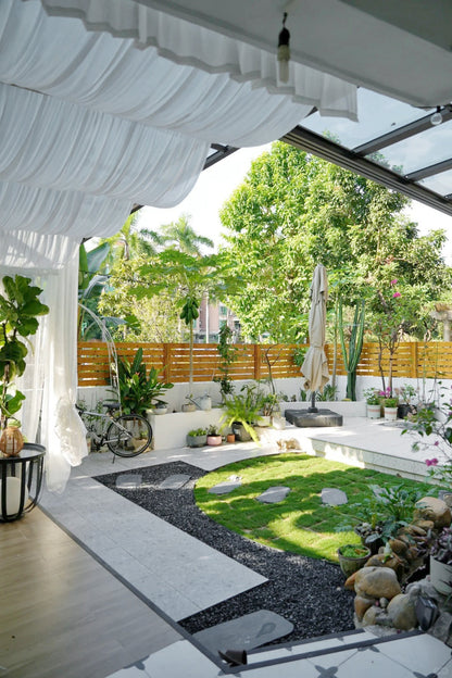 Outdoor curtains on patio with UV protection and water-repellent fabric.