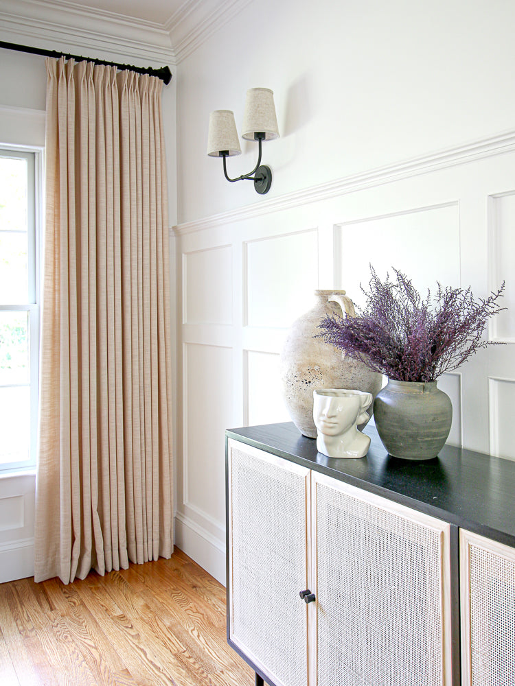Linen blackout curtains in stylish room, enhancing decor with elegance and functionality.
