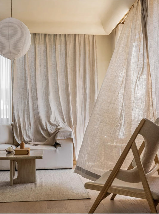 Elegant living room with sheer natural linen curtains from France, enhanced light control for a sophisticated ambiance
