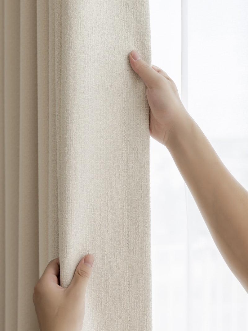 A person gripping a curtain rod, showcasing EaseEase Blackout, Heavyweight Linen Blend Drapery Pleated.