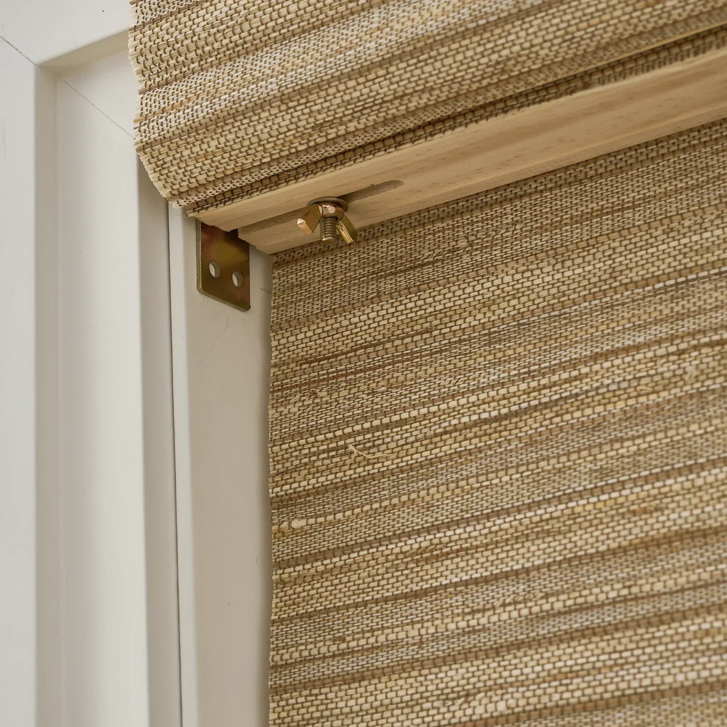 Natural hemp outdoor bamboo shades in beige brown with Roman folds, showcasing eco-friendly craftsmanship and elegant design.
