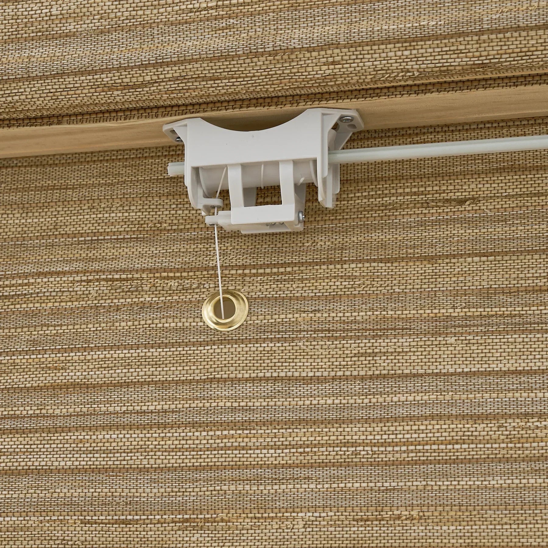 Natural hemp outdoor bamboo shades in beige brown, showcasing handwoven texture and Roman shade design.