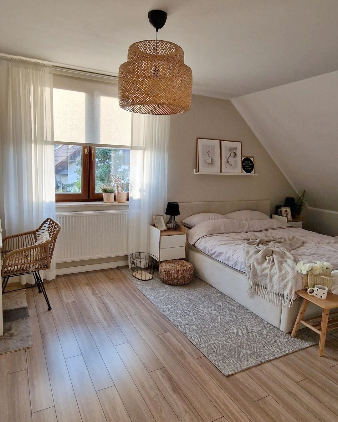 Linen roller shades in cozy bedroom with natural light filtering through.