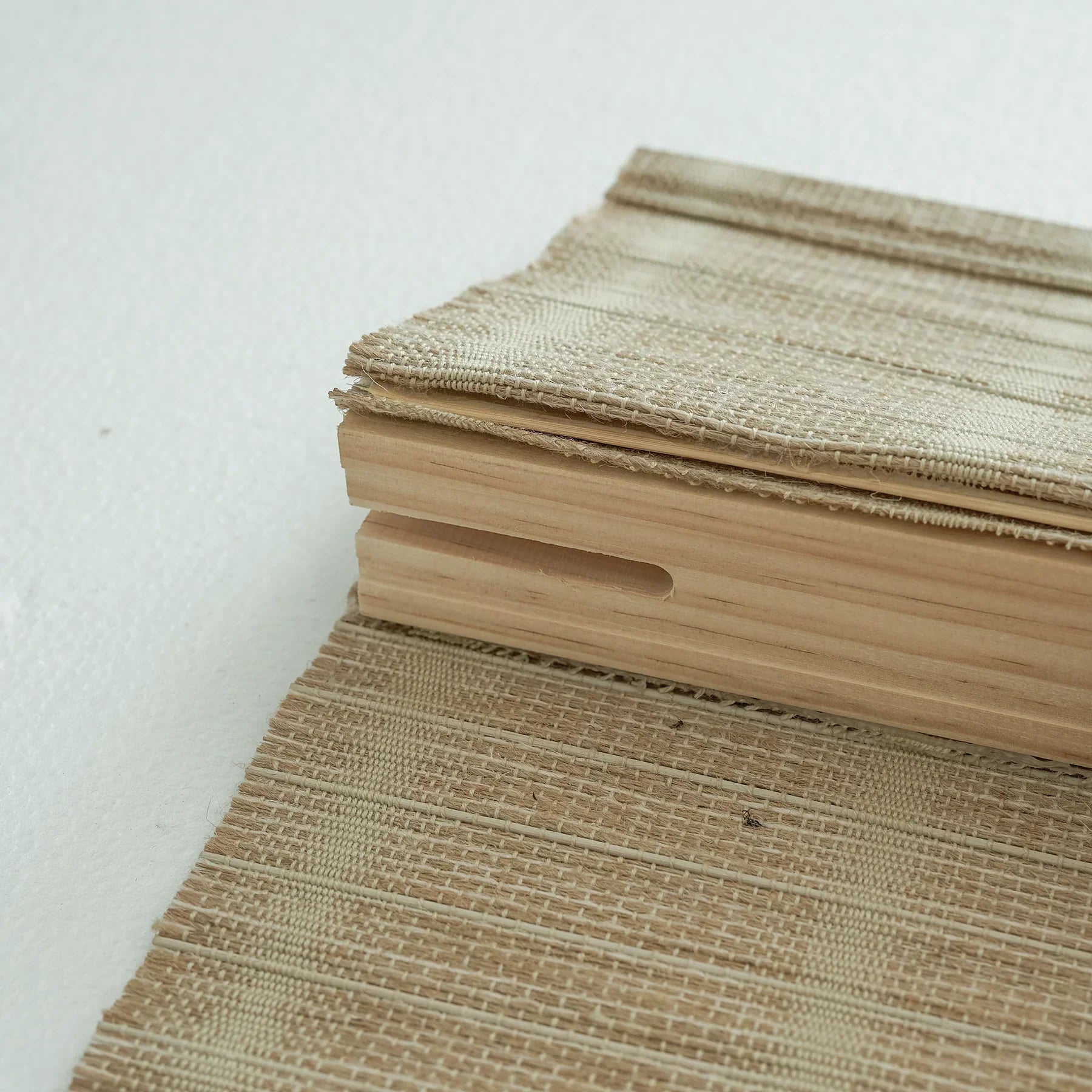 Natural jute bamboo outdoor shades in oak tone, showcasing textured weave and eco-friendly design.