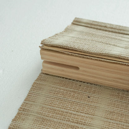 Natural jute bamboo outdoor shades in oak tone, showcasing textured weave and eco-friendly design.