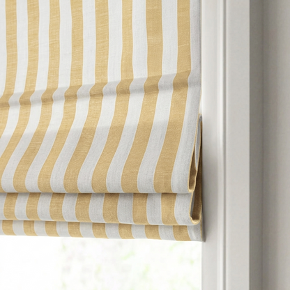 Butter yellow striped linen Roman window shades brightening a modern room