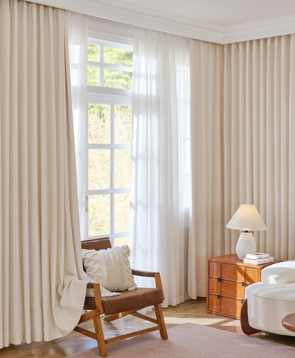 Heavyweight blackout curtains "Pearl Drops" in living room, offering noise cancelling and heat blocking features.