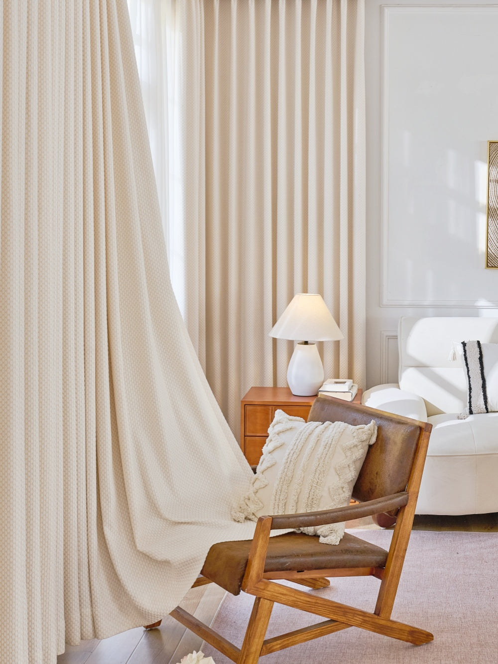 Heavyweight blackout curtains in elegant pearl design for noise cancelling and heat blocking.