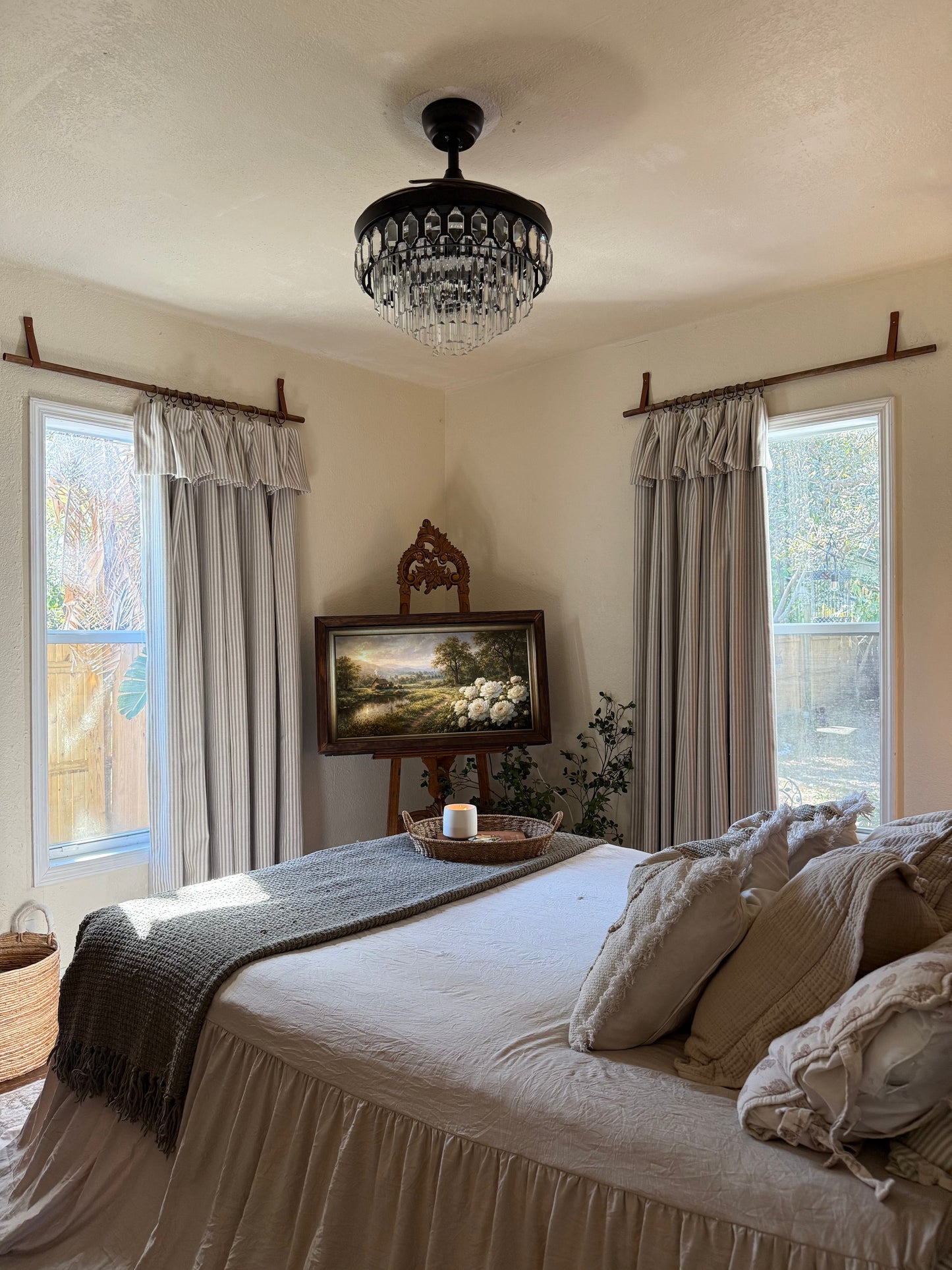 Classic linen striped curtains in neutral tones with fine and bold stripe widths hanging in a modern room