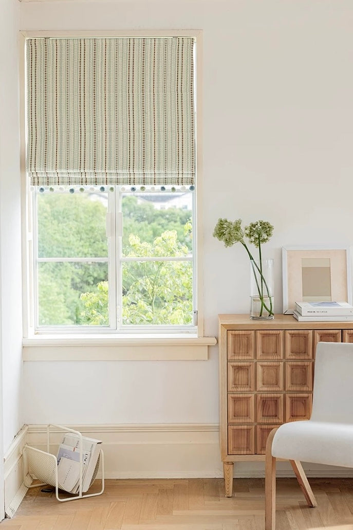 Striped curtains in playroom with jacquard pattern, enhancing retro decor.