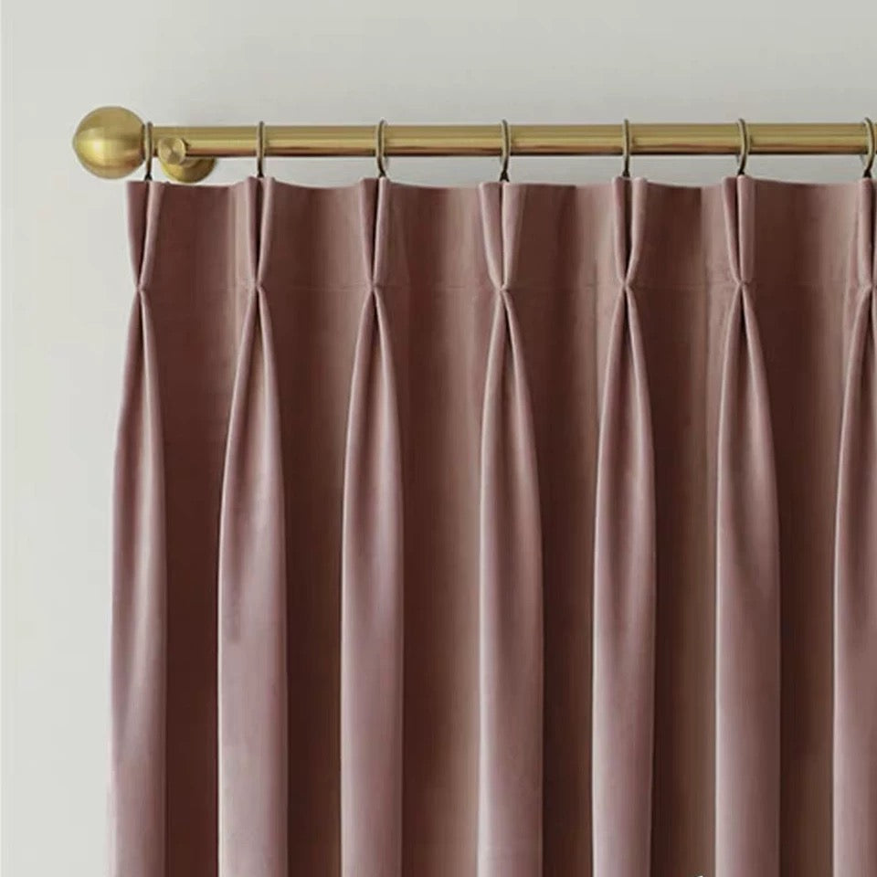 Luxurious soft-sheen velvet drapes in living room setting with creamy texture and rich vintage elegance