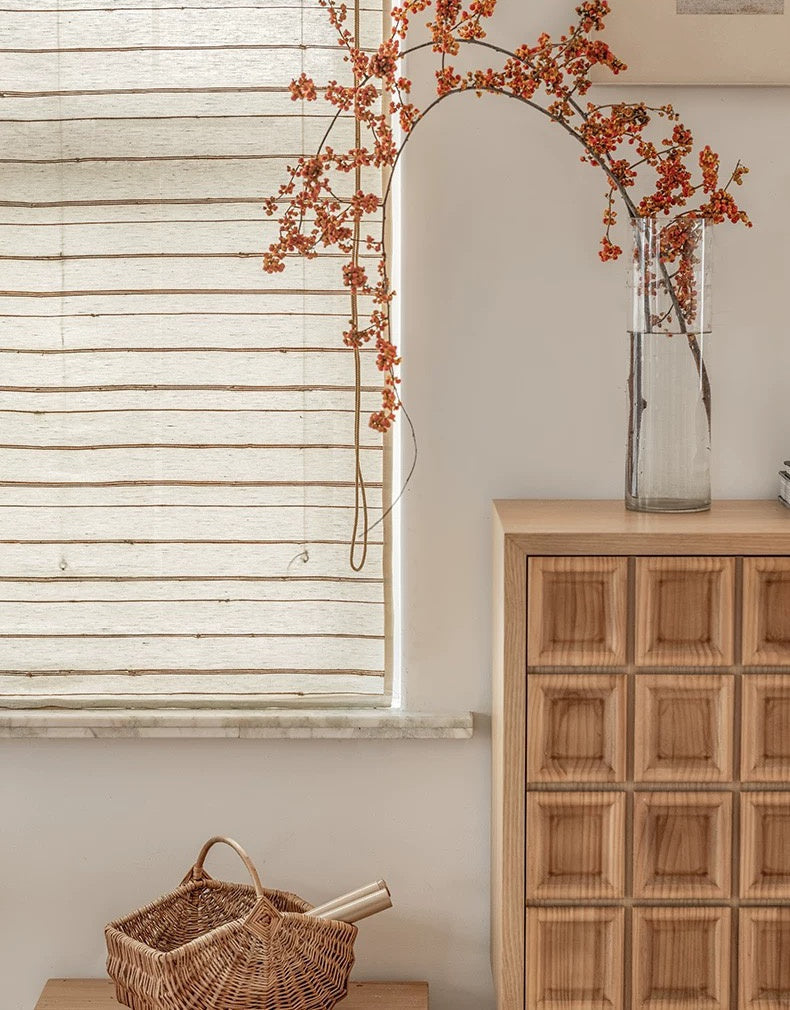 Natural ramie bamboo blinds with unique textured finish in a cozy home setting.