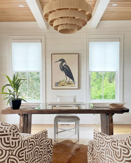 Solar shades in a bright room, offering UV protection and glare reduction.
