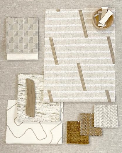 Patterned fabric Roman shades in flat fold style, featuring light filtering and blackout options.