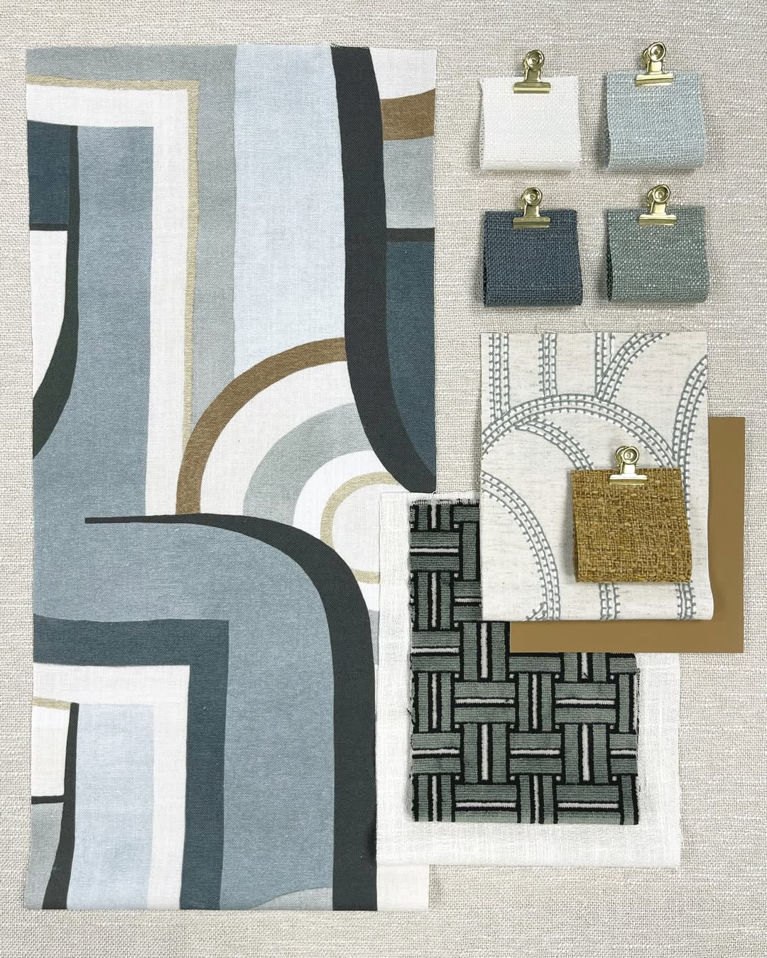 Patterned fabric swatches for Roman shades featuring modern textures and timeless prints, showcasing light-filtering and blackout options.
