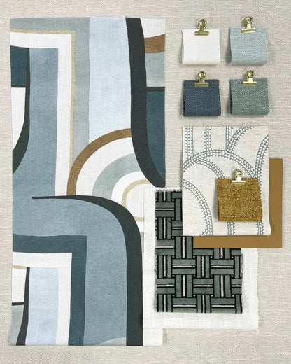 Patterned fabric swatches for Roman shades featuring modern textures and timeless prints, showcasing light-filtering and blackout options.