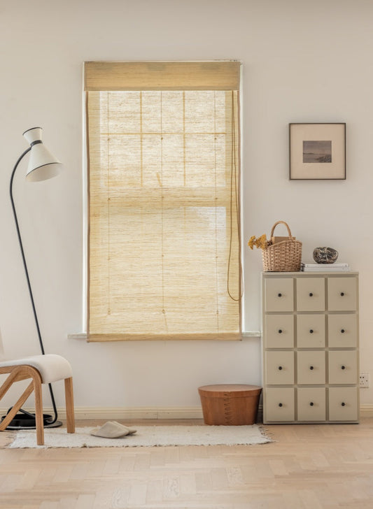 Natural ramie bamboo shades in cashew with mildew-resistant woven design, enhancing airy interiors.