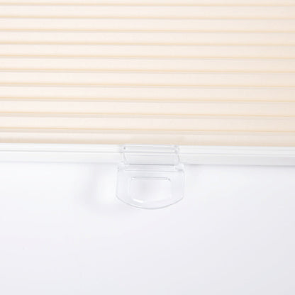 No-drill honeycomb shades with tool-free installation and cordless system.